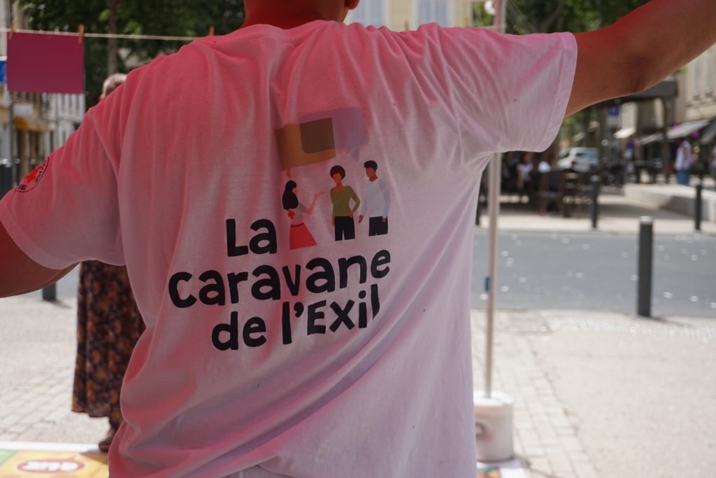 Logo of the Caravane appearing on a T-shirt  